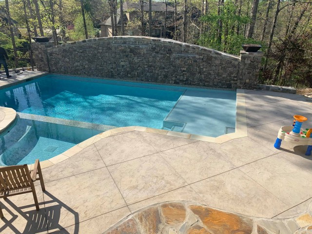 Stamp Concrete with Flagstone Pool Deck in Liberty Park, AL